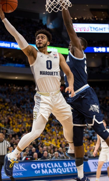 Howard has 38, No. 10 Marquette edges No. 14 Villanova 66-65